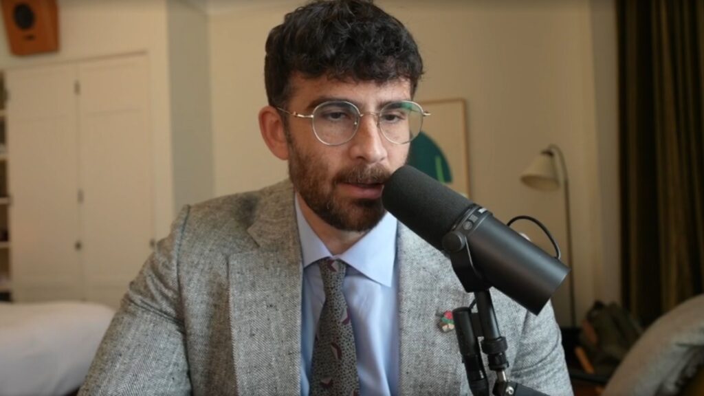 Hasan Piker justifies his decision to display 9/12 newspaper (Image via Twitch/@hasanabi)