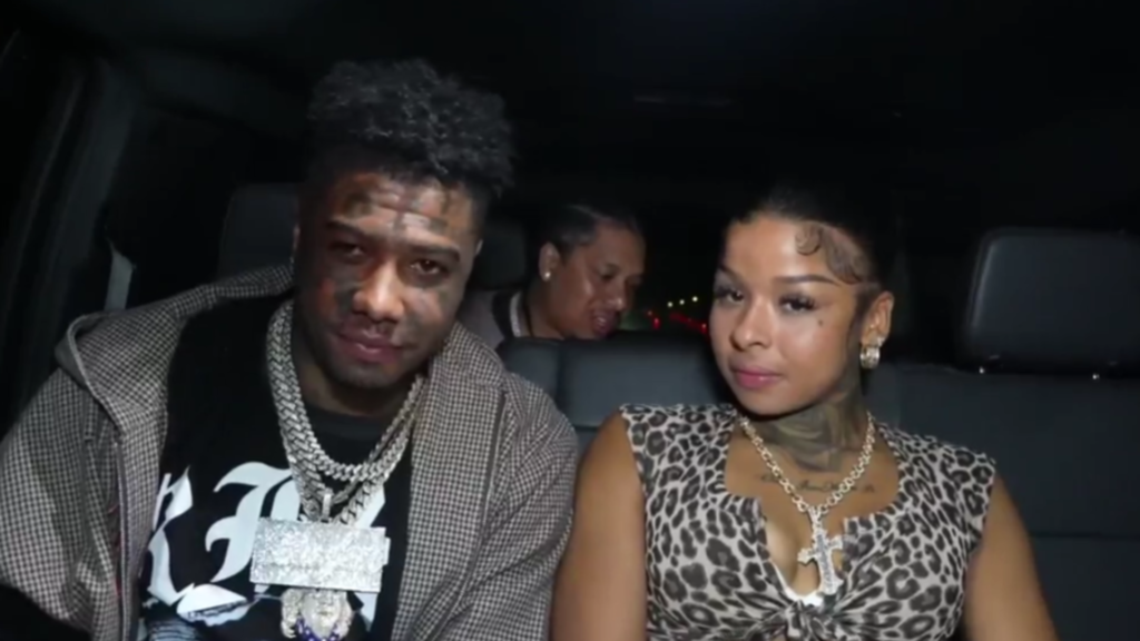 Blueface gets down on one knee to propose to Chrisean Rock at a nightclub as their engagement sparks mixed reactions online (Image via Blueface/ Kick)