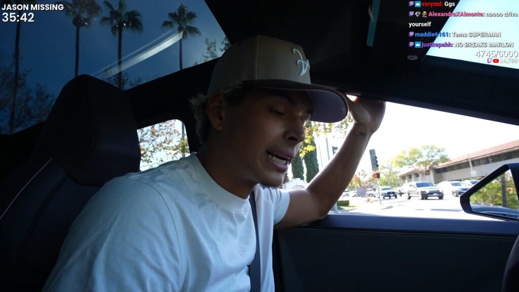 Marlon talking to his viewers while driving (Image via Twitch/Marlon)