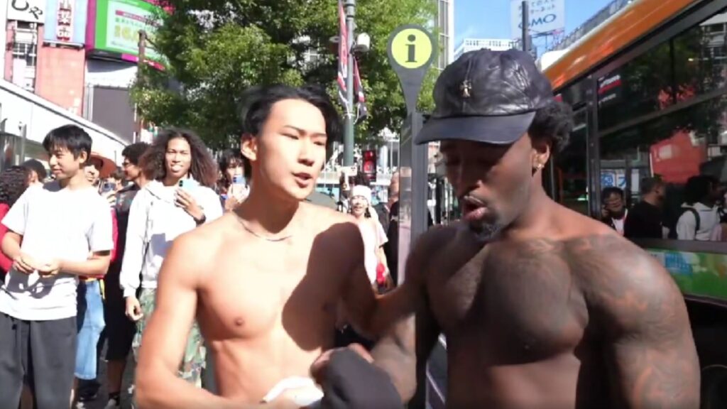 Kai Cenat confronts a man in Japan (Image via Twitch/@kaicenat)